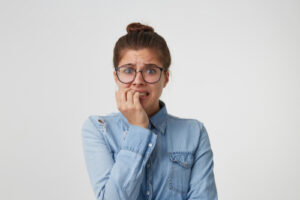 woman biting her nails